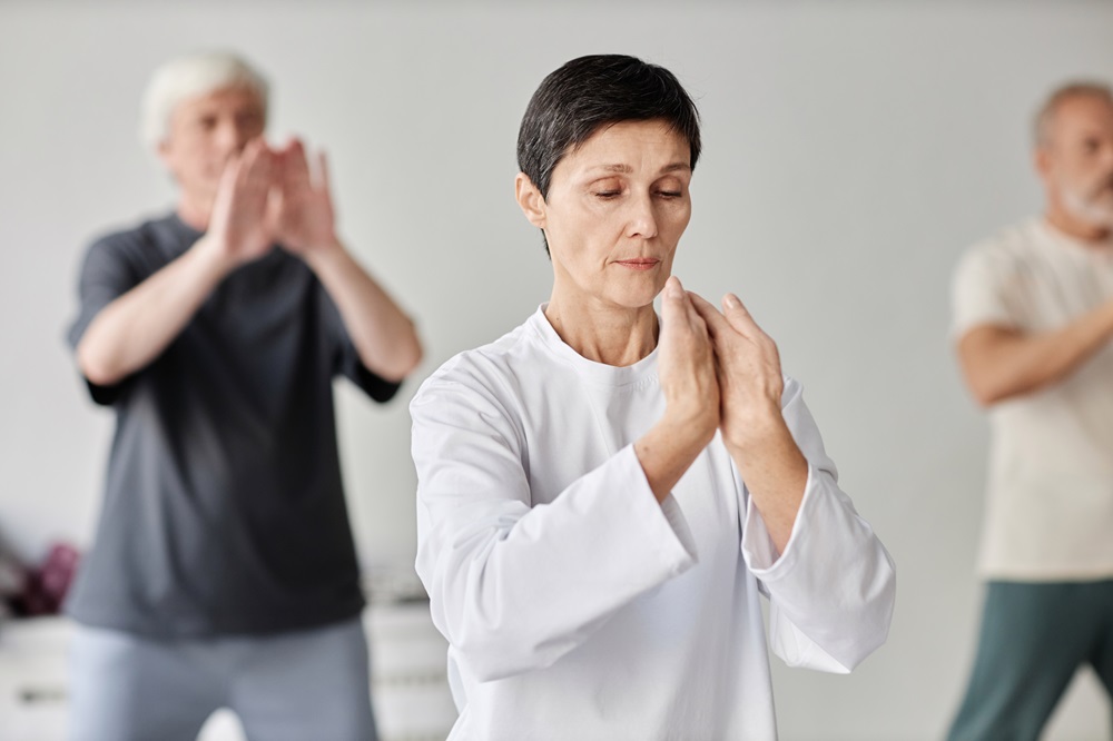 Élèves lors d'une formation de professeure de Qi Gong, Fondation Poorna-Jnana Yoga